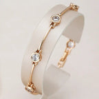 Elegant Bracelet With Zircons In Gold