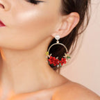 Flower And Pearl Earrings In Gold
