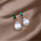 Luxurious Gold Earrings With Pearls And Green Zirconia