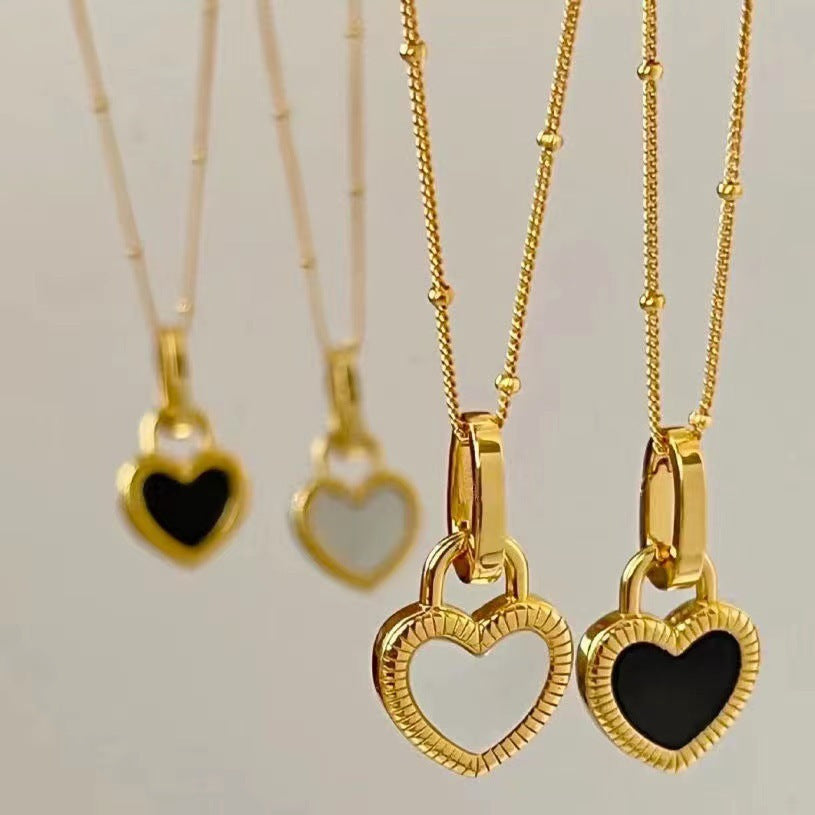 Black And White Heart Pendant Necklace In Gold