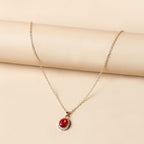 Elegant Emerald Halo Pendant Necklace
