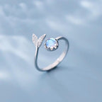 Dolphin Tail Adjustable Ring In Silver And Blue Zirconia